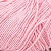 A close-up view of pink yarn. Produktbild-Vorschau