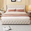 A tufted beige bed with pink and white bedding is shown in a bedroom setting. Produktbild-Vorschau