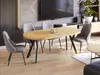 A dining room scene with a table and chairs, set up for a meal. Produktbild-Vorschau