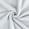 A close-up, swirled view of a soft, silver-colored fabric. Produktbild-Vorschau