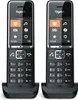 Two Gigaset cordless phones are shown side-by-side on their charging bases. Anteprima dell’immagine prodotto