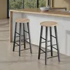 Two bar stools are placed in a modern kitchen setting, with a countertop and window in the background. Náhled obrázku produktu