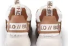 The back view of a pair of beige and brown Buffalo sneakers with white fur trim. Podgląd zdjęcia produktu