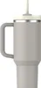 A studio shot of a gray tumbler with a straw. Produktbild-Vorschau