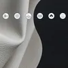 A split image showing a textured white material on the left and a black background on the right, with icons overlaid on both sides. Produktbild-Vorschau