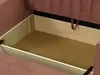 Close-up view of the open storage compartment of a sofa. Náhled obrázku produktu