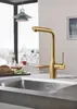 A modern kitchen sink with a gold faucet. Produktbild-Vorschau