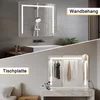 A split image showing a bathroom mirror with a shower reflection and a vanity mirror with clothes hanging behind it. Anteprima dell’immagine prodotto