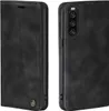 A black flip case for a smartphone is shown from two angles. Produktbild-Vorschau