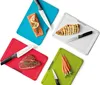 A collection of cutting boards with food and knives on them. Anteprima dell’immagine prodotto