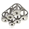 A product shot of a gray bottle carrier with six circular holders, set against a white background. Produktbild-Vorschau