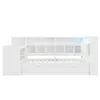 A white bed frame with a desk and shelving unit attached, against a white background. Náhľad obrázku produktu