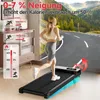 A woman is running on a treadmill in a room, with a scenic mountain road superimposed in the background. Informational graphics about incline and calorie burn are displayed on the left. Produktbild-Vorschau