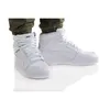 A pair of white Puma high-top sneakers worn by a person, shown from a slightly diagonal front view against a white background. Anteprima dell’immagine prodotto