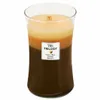 A three-layered scented candle in a glass jar. Náhled obrázku produktu
