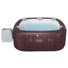 An inflatable hot tub filled with water, with a control unit attached to the side. Produktbild-Vorschau