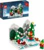 A LEGO set depicting a winter scene with elves and Christmas trees, shown both in its packaging and built. Náhled obrázku produktu