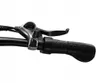 A close-up view of an electric bicycle's handlebar, showing the gear shifter and brake lever. Anteprima dell’immagine prodotto