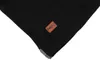 A close-up view of a black fabric item, likely a garment, with a small brown tag bearing the 'NEO TOOLS' logo. Produktbild-Vorschau