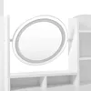 A close-up view of a white vanity table with a lighted mirror and shelves. Produktbild-Vorschau
