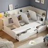 A white multifunctional bed with storage compartments is shown in a room setting. Produktbild-Vorschau