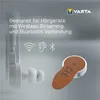 A VARTA hearing aid battery and a hearing aid are shown with icons representing wireless streaming and Bluetooth. Produktbild-Vorschau