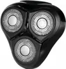 A close-up view of a black electric shaver head with three circular rotary blades. Voir les images du produit