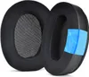 Two black ear pads for headphones are shown, with a cutaway revealing a blue foam layer on one of them. Produktbild-Vorschau