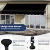 A black awning is installed above a set of glass doors on a building, with marketing text overlays and close-up diagrams of product features. Náhled obrázku produktu