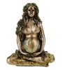 A bronze figurine of a pregnant woman adorned with green leaves, sitting in a lotus pose. Produktbild-Vorschau