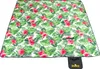 A picnic blanket with a floral pattern is laid out flat. Náhled obrázku produktu