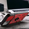 A close-up of a red and black iPhone 13 Pro case with a ring stand, placed on a wooden surface next to a laptop and headphones. Produktbild-Vorschau