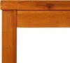A close-up view of the corner of a wooden table or furniture piece. Náhled obrázku produktu