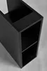 A close-up, angled view of a black shelf unit. Náhľad obrázku produktu
