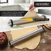 A collage showing a rolling pin being used to roll out dough in a kitchen setting and on a wooden table. Produktbild-Vorschau