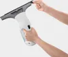 Hands holding and demonstrating a Kärcher WV 1 electric window cleaner. Náhľad obrázku produktu