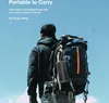 A person with a backpack on a hike, with a speaker attached to the backpack. Podgląd zdjęcia produktu