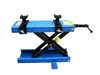 A blue and black scissor lift motorcycle jack is shown against a white background. Náhľad obrázku produktu
