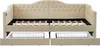 A beige upholstered daybed with its mattress support frame exposed and two storage drawers pulled out from underneath. Anteprima dell’immagine prodotto