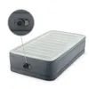 A gray and white inflatable air mattress is shown against a white background. A close-up inset highlights the inflation valve and control dial. Náhled obrázku produktu