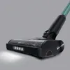 Close-up of the head of a vacuum cleaner with LED lights on. Produktbild-Vorschau