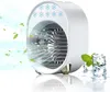 A portable mini air cooler with ice cubes and mint leaves to emphasize its cooling effect. Produktbild-Vorschau