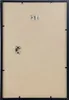 The back of a black picture frame with mounting hardware. Produktbild-Vorschau