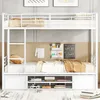 A white metal bunk bed with storage drawers and shelves underneath, set up in a room with decorative items on the wall. Anteprima dell’immagine prodotto