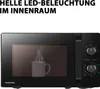 A black Toshiba microwave with a steaming mug inside, set against a white background. Text overlays highlight features. Produktbild-Vorschau