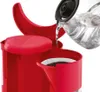 Water being poured into a coffee maker. Anteprima dell’immagine prodotto