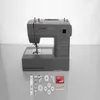 A gray Singer Heavy Duty sewing machine is displayed on a reflective surface with a white background. Accessories for the sewing machine are laid out in front of it. Náhled obrázku produktu