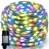 A coiled string of colorful LED lights with a power adapter. Produktbild-Vorschau
