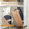 A bathroom cabinet with a tilting laundry basket feature. Náhled obrázku produktu