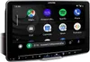 A close-up view of an Alpine car stereo system's touchscreen display showing various app icons and navigation information. Podgląd zdjęcia produktu